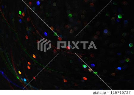 Abstract black background with bokeh of different colors. Abstract black background with bokeh of different colors. 116716727