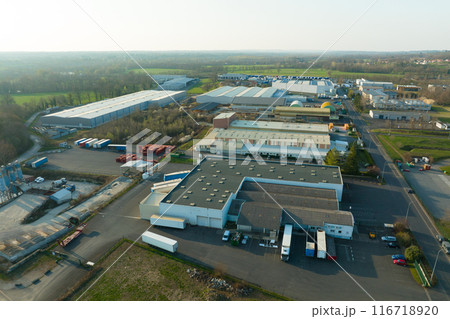 Aerial view of modern factory structure for production and distribution of industrial equipment. Concept of global industry 116718920