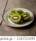 fresh kiwi on plate 116721095
