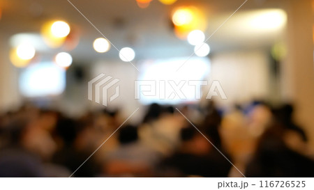 Blurred background people join seminar business event in auditorium hall convention.  Presentation meeting at conference room present screen business. Blurred background with copy space 116726525