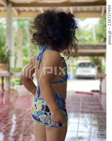 back view of a beautiful woman in swimsuit 116727493