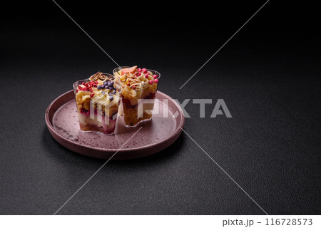 Delicious nutritious vegan dessert trifle with berries, cheese cream Delicious nutritious vegan dessert trifle with berries, cheese cream 116728573