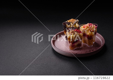 Delicious nutritious vegan dessert trifle with berries, cheese cream 116728622