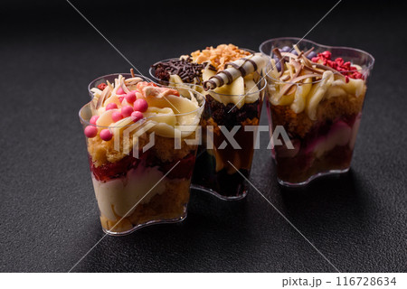 Delicious nutritious vegan dessert trifle with berries, cheese cream Delicious nutritious vegan dessert trifle with berries, cheese cream 116728634