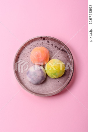 Delicious sweet chilled mochi desserts with fruit filling Delicious sweet chilled mochi desserts with fruit filling 116728698