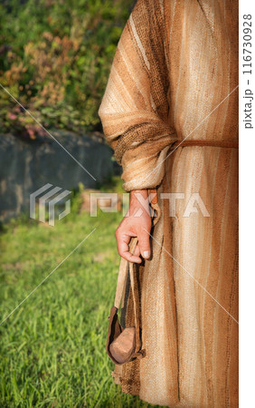 Ancient man with a sling 116730928