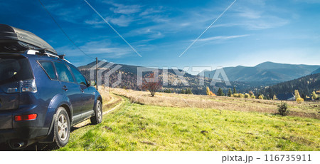 car for traveling with a mountain road 116735911