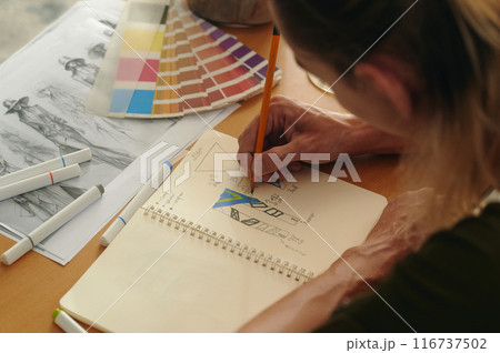 Designer Developing His New Collection 116737502