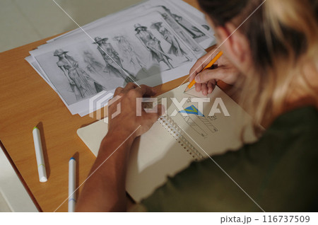 Designer Working With His Sketches Designer Working With His Sketches 116737509