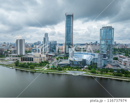 Yekaterinburg city with Buildings of Regional Government and Parliament, Dramatic Theatre, Iset Tower, Yeltsin Center, panoramic view at summer sunset. Yekaterinburg city with Buildings of Regional Government and Parliament, Dramatic Theatre, Iset Tower, Yeltsin Center, panoramic view at summer sunset. 116737974