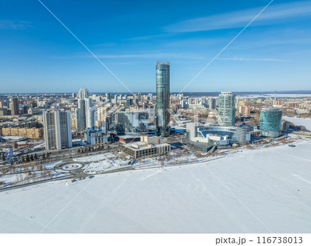 Yekaterinburg city with Buildings of Regional Government and Parliament, Dramatic Theatre, Iset Tower, Yeltsin Center, panoramic view at winter sunset. Yekaterinburg city with Buildings of Regional Government and Parliament, Dramatic Theatre, Iset Tower, Yeltsin Center, panoramic view at winter sunset. 116738013
