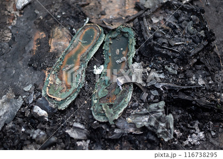 the old shoes burned to ashes in a fire the old shoes burned to ashes in a fire 116738295
