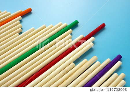 Abstract wooden sticks and colored ones as a concept of success and difference. 116738908