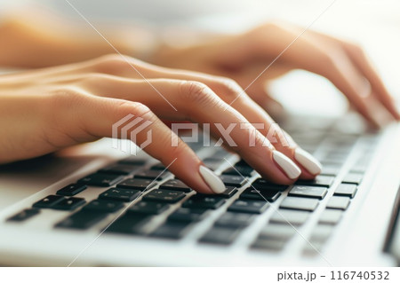 Close-up of Female Hands Typing on Laptop Keyboard for Business and Technology Close-up of Female Hands Typing on Laptop Keyboard for Business and Technology 116740532