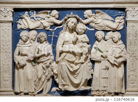 Madonna Enthroned, work by Luca della Robbia, Medici Chapel, Basilica di Santa Croce (Basilica of the Holy Cross) - famous Franciscan church in Florence, Italy 116740616