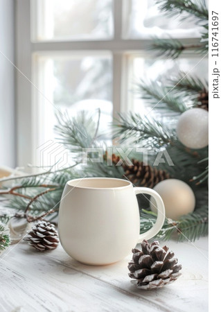 Cozy Winter Atmosphere with Warm Drink and Pine Cones 116741697