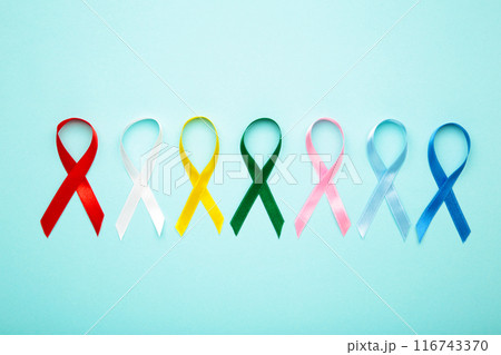 Collection of awareness ribbons on blue. World cancer day Collection of awareness ribbons on blue. World cancer day 116743370