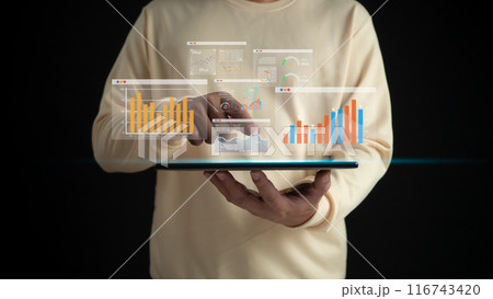 Analysts use tablets and dashboards for marketing analysis, Strategic planning analysis with information on management, Analyze performance and report for operations management, Data analysis concept. Analysts use tablets and dashboards for marketing analysis, Strategic planning analysis with information on management, Analyze performance and report for operations management, Data analysis concept. 116743420