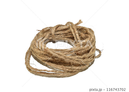A skein of twine on a white background. 116743702
