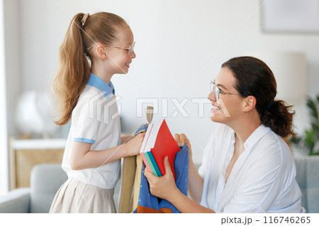 Happy family preparing for school Happy family preparing for school 116746265