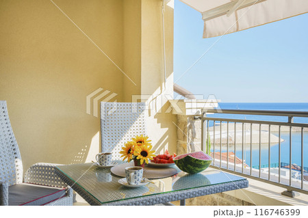 Sunny Mediterranean Balcony Breakfast with Sea View 116746399