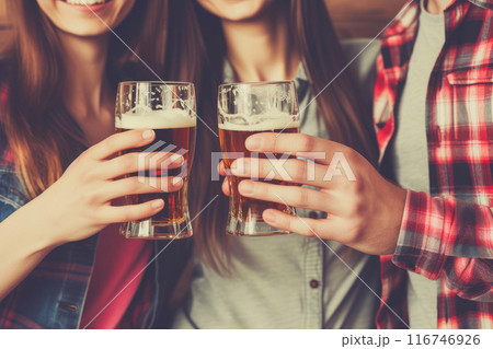 Cheers to Friendship: Friends Sharing a Beer Moment 116746926