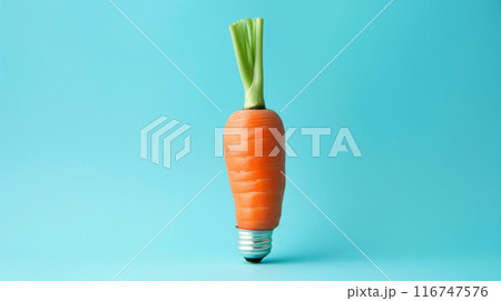 Carrot with light bulb base on blue background, creative concept 116747576