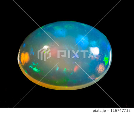 natural rainbow opal gem isolated on black background 116747732