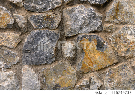 Texture of a stone wall. Old castle stone wall texture background.1 116749732