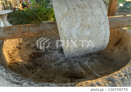 An old stone mill near a restaurant in Cyprus 7 116749778