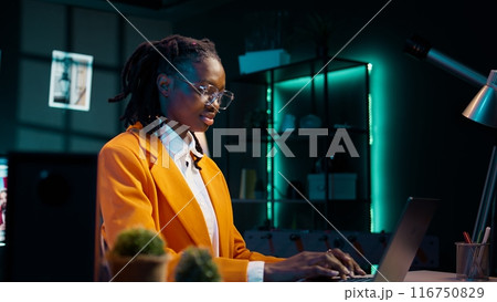 Hardworking girl studying business administration remotely, attending online classes and webinars on dedicated academic platform. College student researching for assignments and projects. Camera B. Hardworking girl studying business administration remotely, attending online classes and webinars on dedicated academic platform. College student researching for assignments and projects. Camera B. 116750829