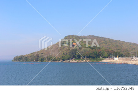 View of Ubonrat Dam during the day with sunlight and clear weather. View of Ubonrat Dam during the day with sunlight and clear weather. 116752349