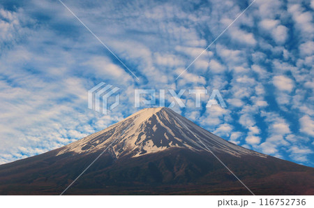 Mount Fuji on the blue sky background. Mount Fuji on the blue sky background. 116752736