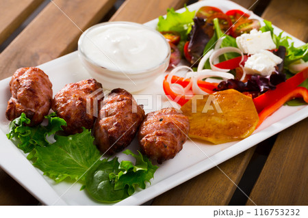 Image of kebets with vegetables in plate 116753232