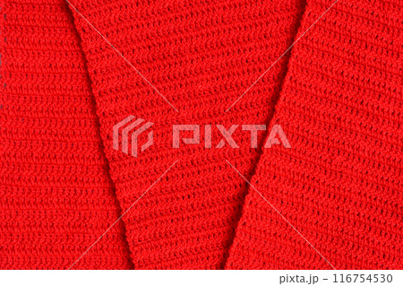 overlap of red wool knitted yarn texture, woolen fabric background 116754530