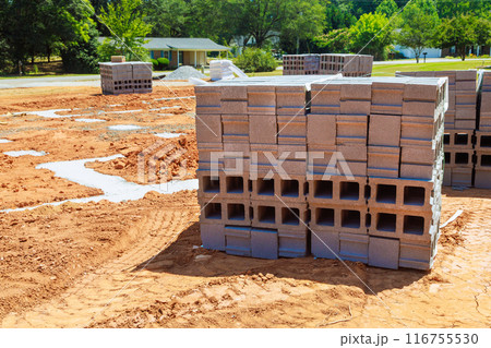 Delivery building blocks has been made to construction site for purpose of mounting cement block walls 116755530