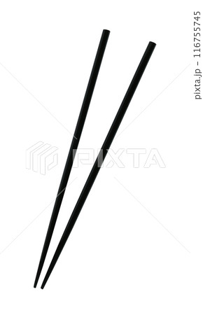 Wooden chopsticks are used as eating utensils. Wooden chopsticks are used as eating utensils. 116755745