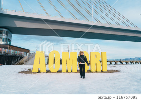 Woman tourist sightseeing Aomori Bay Bridge area, Traveler travel in Aomori city, Aomori Prefecture, Japan. Landmark for tourist attraction, travel and vacation 116757095