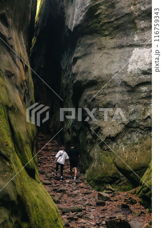 couple tourists walking by canyon couple tourists walking by canyon 116759343