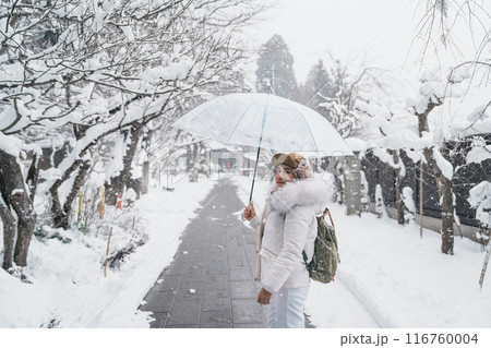 Woman tourist sightseeing Yamadera temple with snow in winter, traveler travel Risshakuji temple in Yamagata City, in Yamagata Prefecture, Tohuku, Japan. Landmark for tourists attraction in Japan Woman tourist sightseeing Yamadera temple with snow in winter, traveler travel Risshakuji temple in Yamagata City, in Yamagata Prefecture, Tohuku, Japan. Landmark for tourists attraction in Japan 116760004