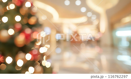 Blurred Christmas Lights in a Shopping Center Background. Festive Holiday Atmosphere, Warm Bokeh Lights 116762297