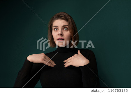 Woman in Black Shirt Making Funny Face 116763186