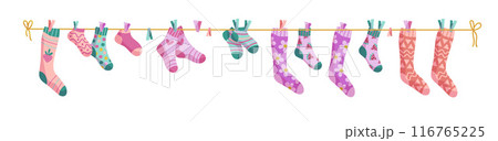 Clothesline socks. Socks on a rope, Baby socks with patterns vector cartoon. 116765225