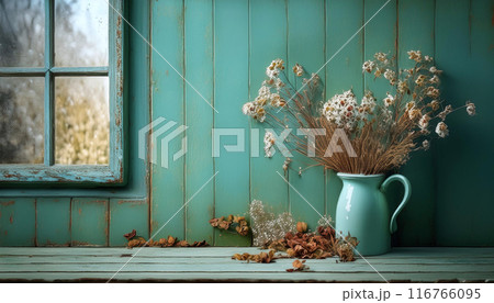 緑の壁紙のナチュラルインテリアに飾られたアンティークポットに挿したドライフラワー 緑の壁紙のナチュラルインテリアに飾られたアンティークポットに挿したドライフラワー 116766095