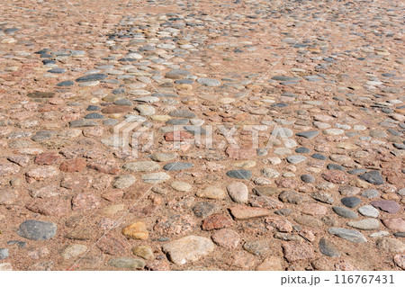 cobblestone pavement made from natural boulders cobblestone pavement made from natural boulders 116767431