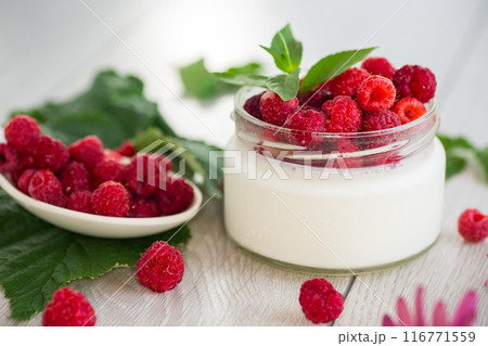homemade food, milk yogurt with fresh raspberries 116771559