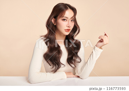 Beautiful young asian woman with clean fresh skin on beige background, Face care, Facial treatment, Cosmetology, beauty and spa, Asian women portrait. 116773593