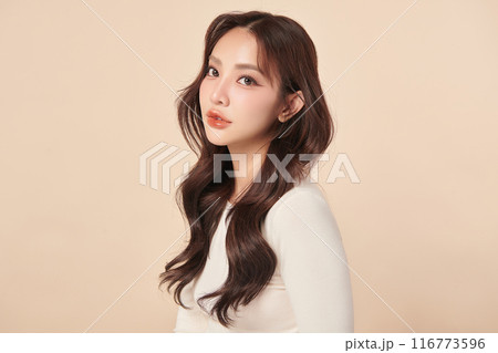 Beautiful young asian woman with clean fresh skin on beige background, Face care, Facial treatment, Cosmetology, beauty and spa, Asian women portrait. Beautiful young asian woman with clean fresh skin on beige background, Face care, Facial treatment, Cosmetology, beauty and spa, Asian women portrait. 116773596