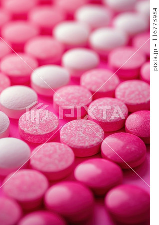 Pink and white pills on a pink surface, close up view. Vertical background. Generative AI 116773984