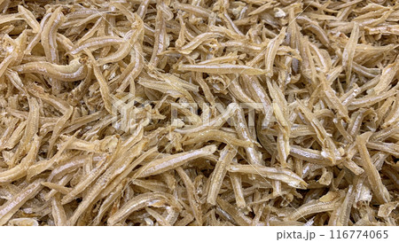 Top view of anchovies displayed in supermarket. Dry seafood concept. Top view of anchovies displayed in supermarket. Dry seafood concept. 116774065